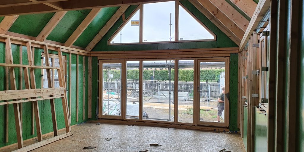 inside the COPHouse in week3, showing windows and house structure before internal boarding